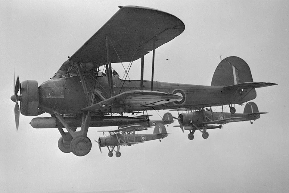 Swordfish Mark Is of No. 785 Squadron from Royal Naval Air Station Crail in Scotland embark on a torpedo training flight in 1939. (Imperial War Museum A 3533)