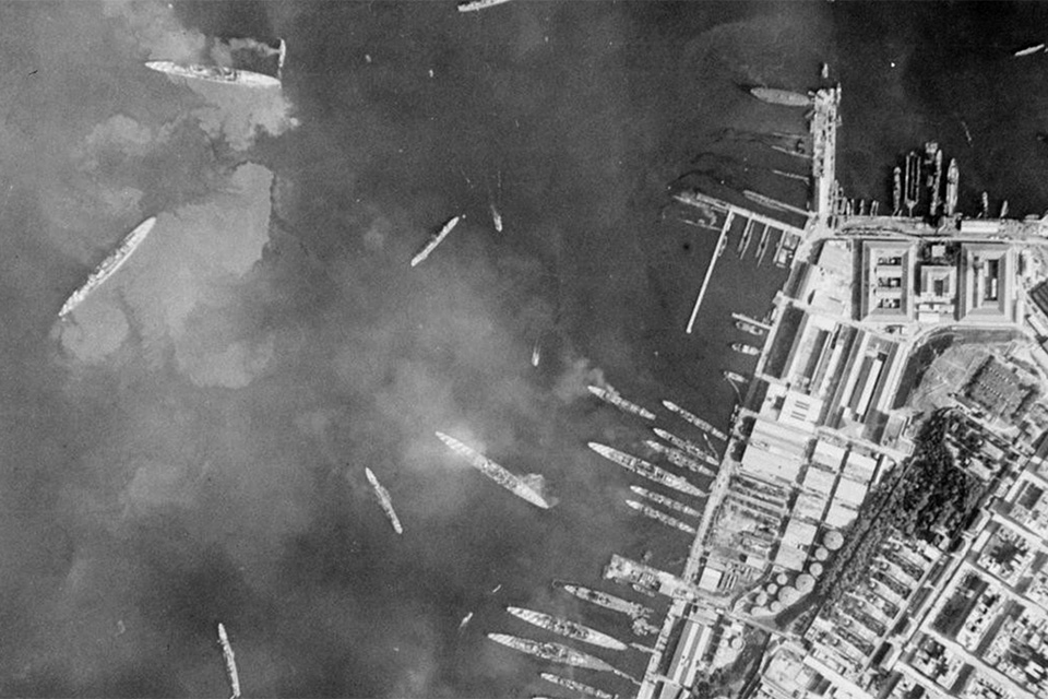A post-strike photo of Taranto shows the devastation wrought on the Italian fleet by the aircraft carrier Illustrious’ Swordfish on November 11, 1940. (Imperial War Museum CM 164)