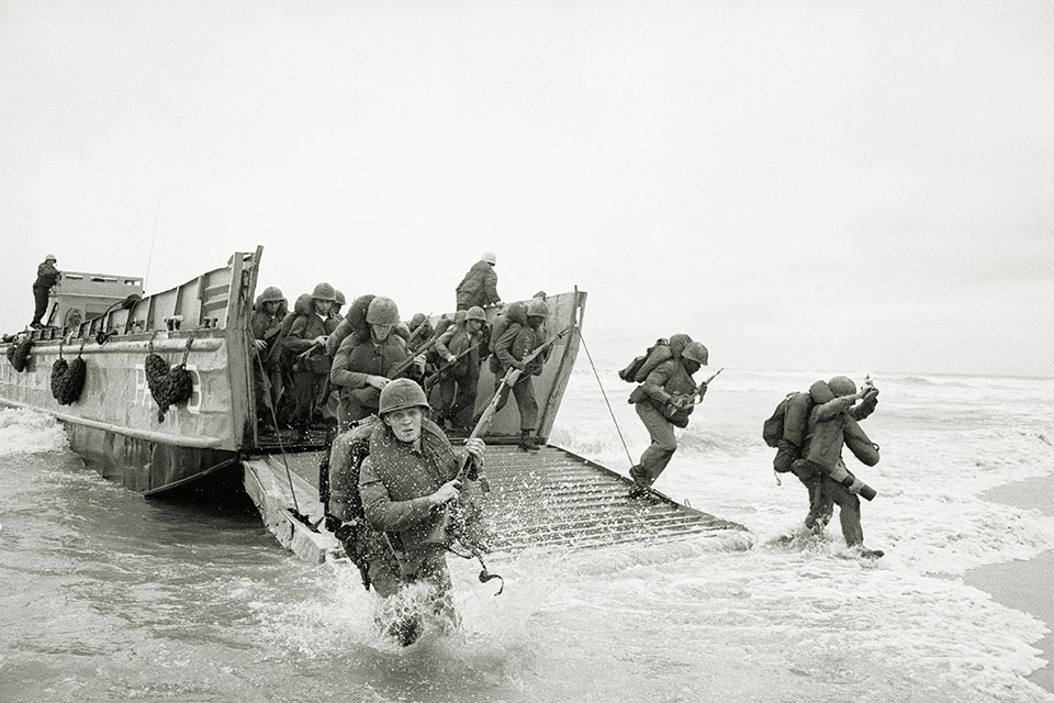 The first U.S. combat troops to arrive in Vietnam, a battalion from the 3rd Marine Division, come ashore at a beach north of Da Nang on March 8, 1965. (Bettmann/Getty Images)