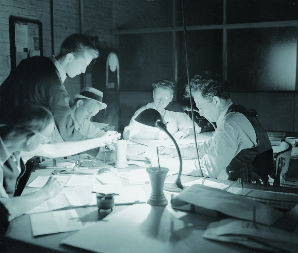 Los Angeles Daily News staff work by desk lamp during one of the city’s regular wartime blackouts. BETTMANN/GETTY IMAGES
