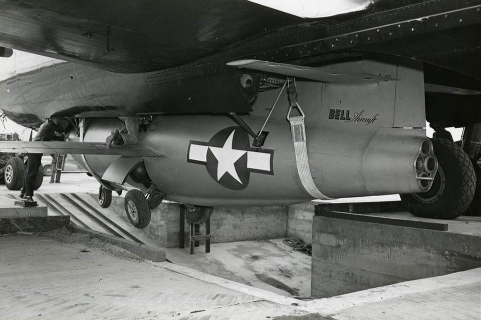 An X-1 is hoisted into the B-29’s bomb bay. (NASA)