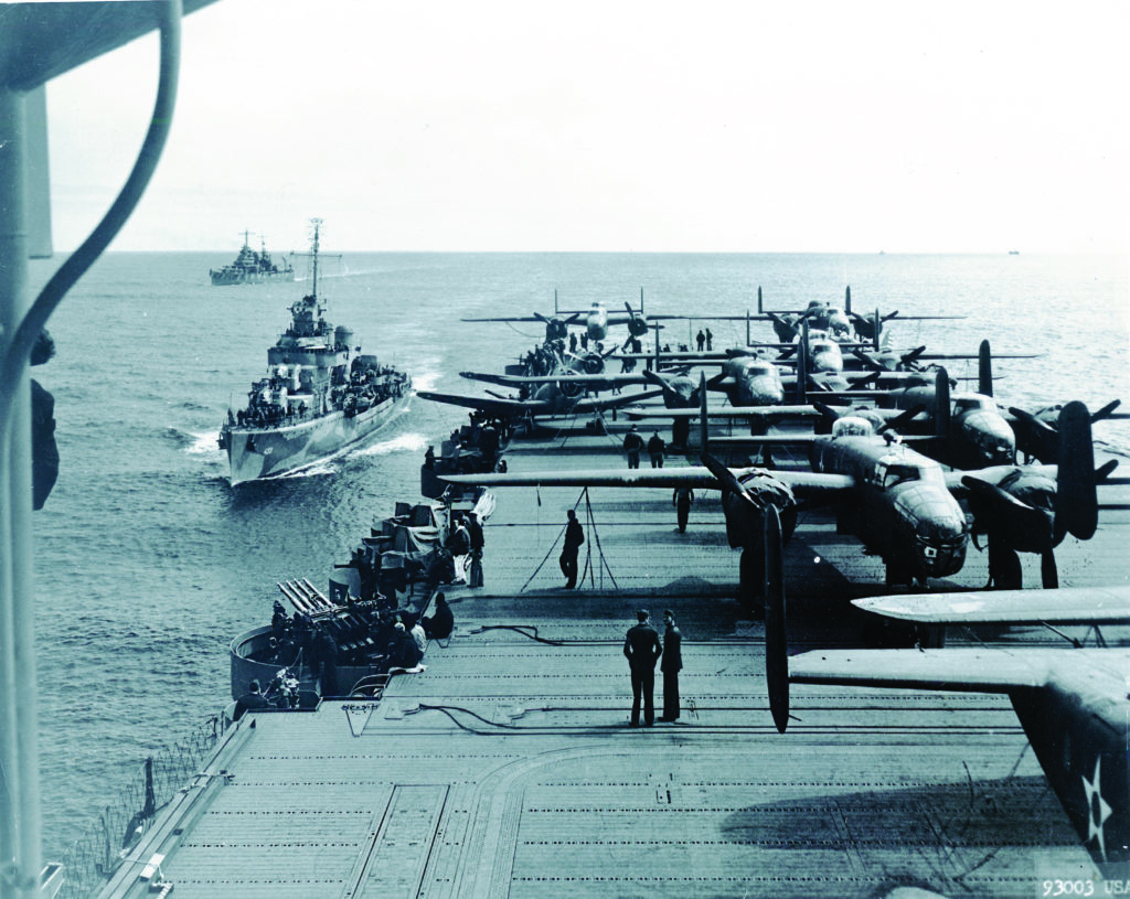 The Doolittle Raiders’ B-25s, secured to the deck of USS Hornet, head west from California toward Japan in April 1942. NATIONAL ARCHIVES
