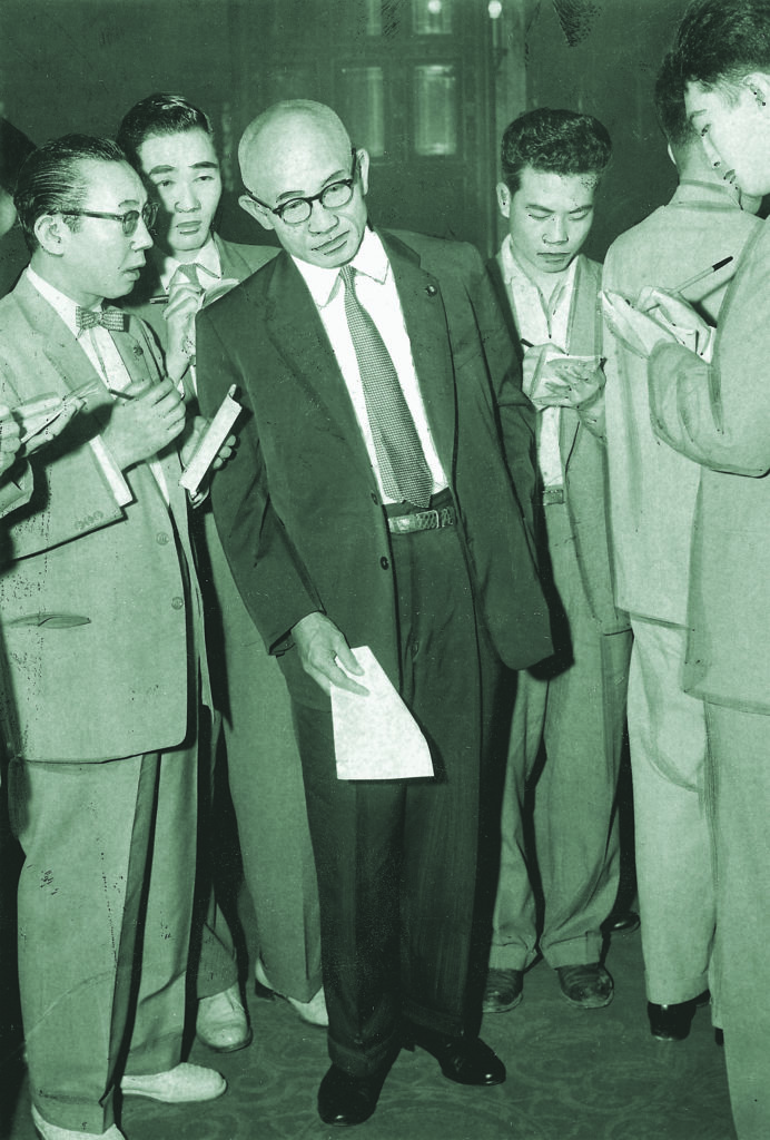 Tsuji (at center) had a successful postwar career in Japan’s parliament—until Kawaguchi publicly revealed his evil acts. THE MAINICHI NEWSPAPERS/AFLO