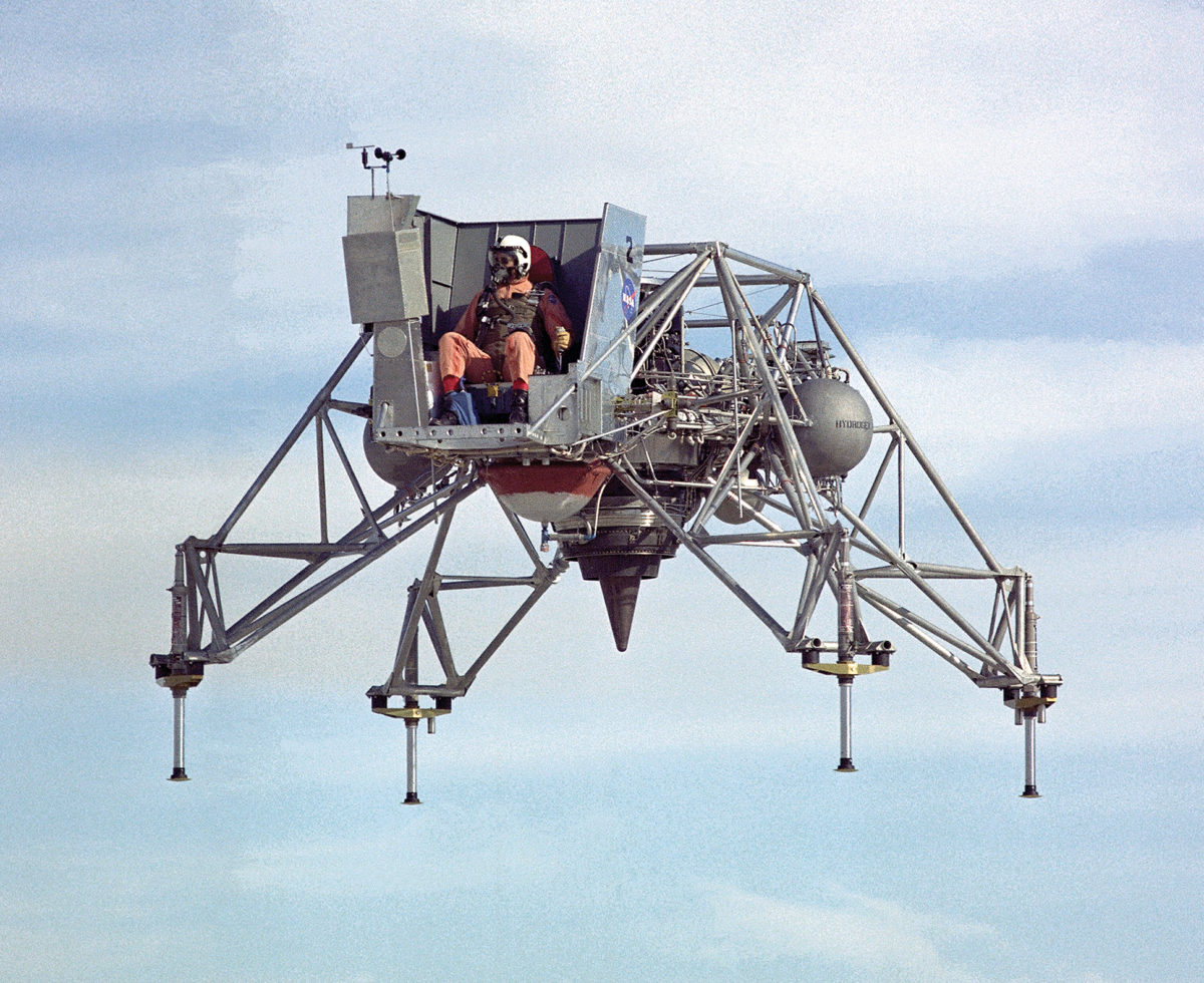 An astronaut trains for a prospective moon landing in a Lunar Landing Research Vehicle (LLRV) at the NASA Flight Research Center in 1967.