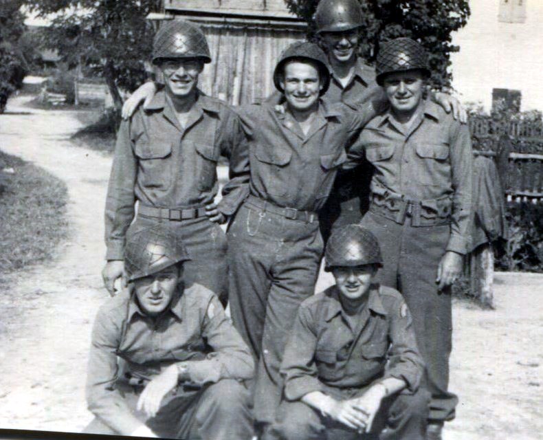 Dorris, tall in the back, with a group of his 42nd Infantry Division comrades. 