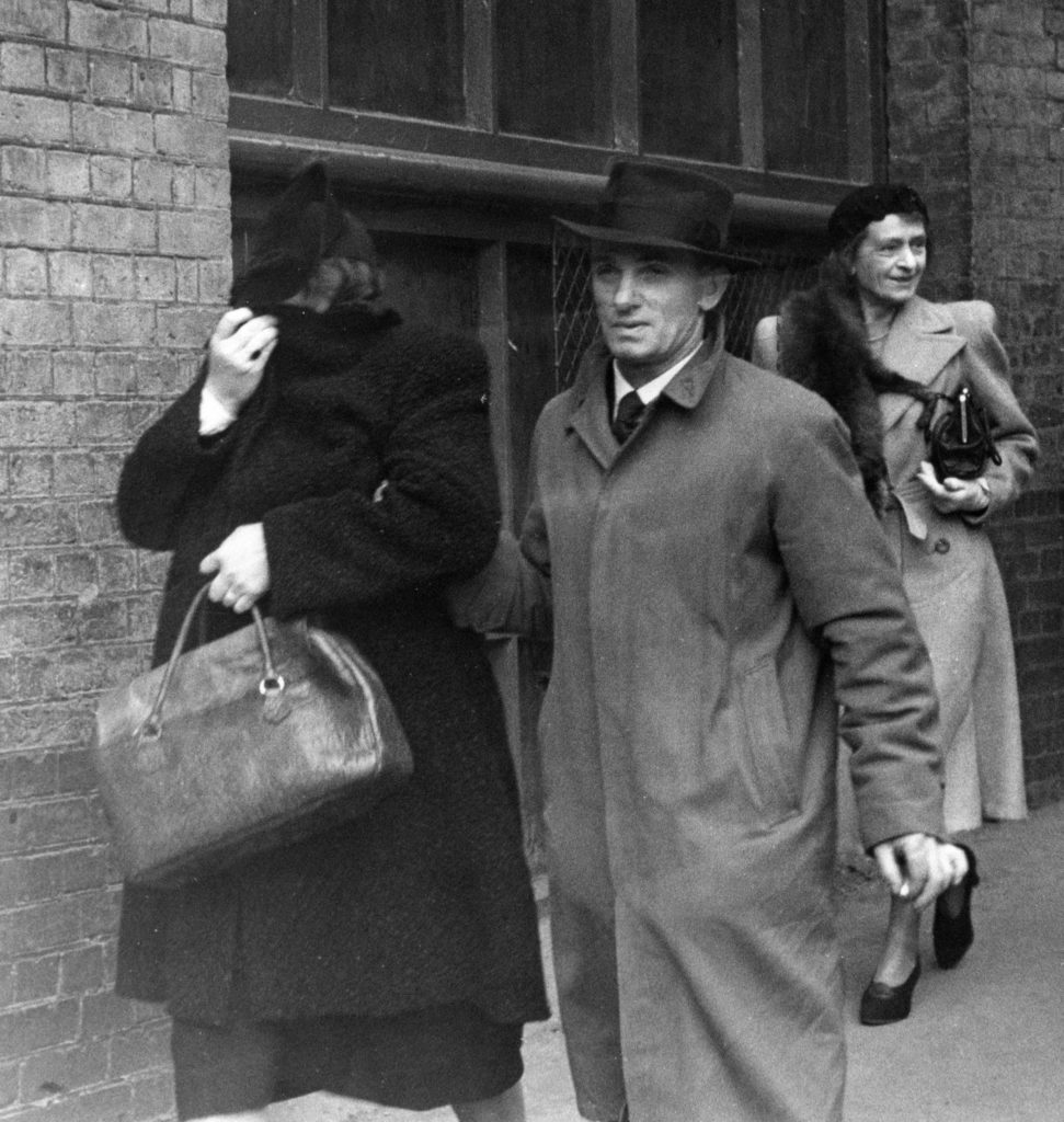 Duncan (left) heads into her 1944 London trial. The mystic was charged with violating Britain's Witchcraft Act of 1735, which made it a crime to claim to possess supernatural powers. (Daily Mirror/Mirrorpix/Getty Images)