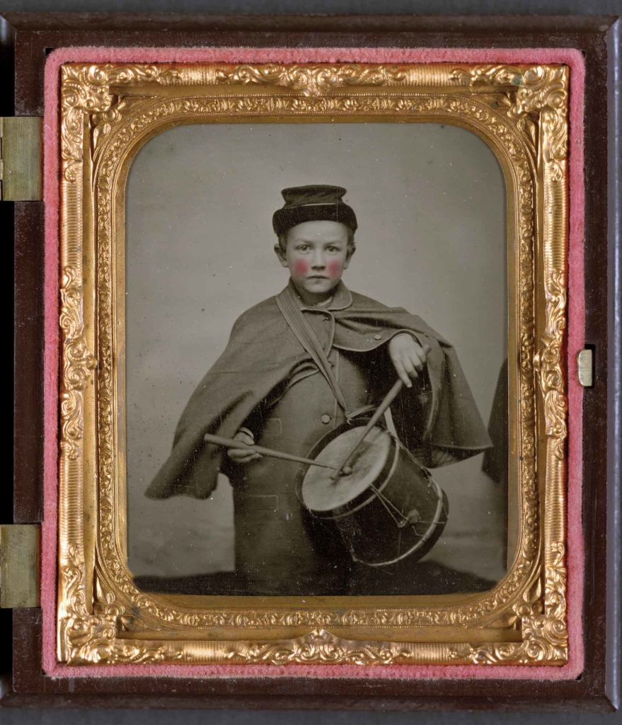 An unidentified drummer boy, dressed in his winter overcoat. (Library of Congress)