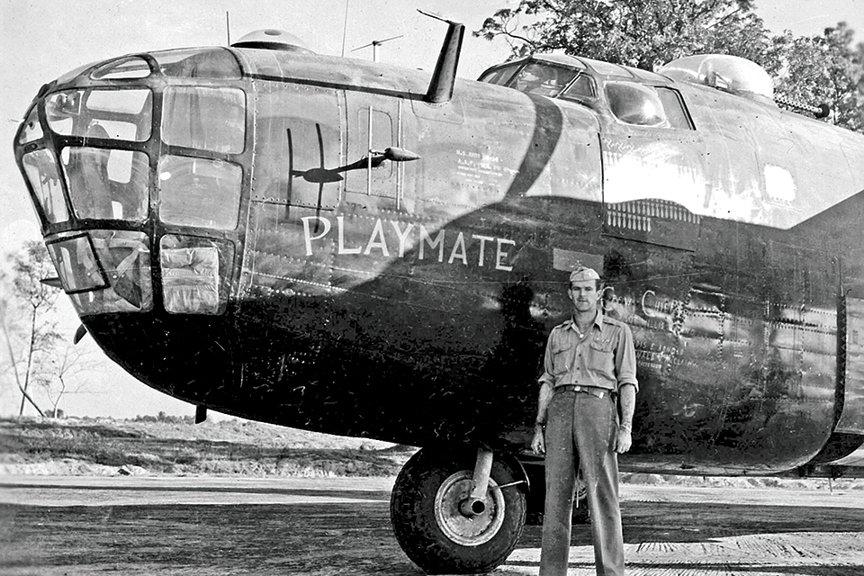 Sergeant William T. Alexander, flight engineer, stands with B-24D no. 42-63980, "Playmate," of the 858th Bomb Squadron, 801st/492nd Bomb Group “Carpetbaggers" in 1944. (HistoryNet Archives)