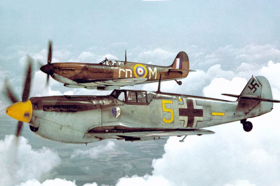 Neither the HA-1112 (foreground) nor the Spitfire Mk. IX fought in the real Battle of Britain, but both were powered by Rolls-Royce Merlin engines. (©Mary Evans Picture Library)