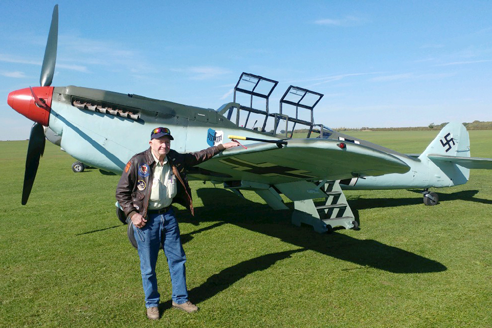 Wilson “Connie” Edwards sands beside the rare HA-1112-M4L two-seater. (Daisy Grace)
