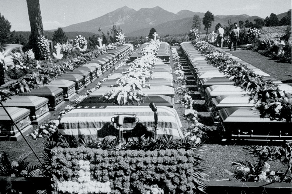 The remains of 67 of the TWA crash victims await burial at Citizens Cemetery in Flagstaff, Ariz. Twenty-nine unidentified United victims were interred at Grand Canyon Cemetery. (A.Y. Owen/Time Life Pictures/Getty Images)