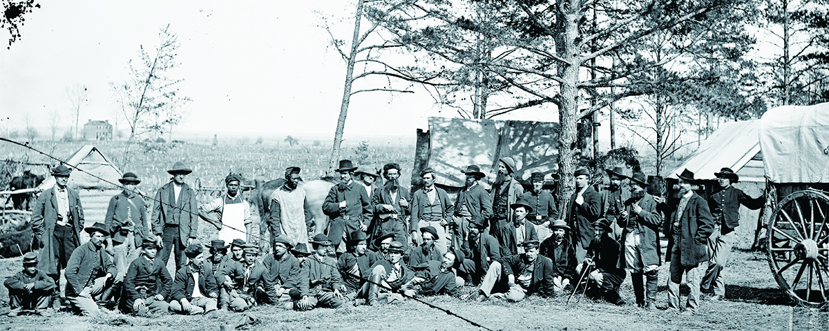 These scouts and guides, photographed in April 1863, were part of the Army of the Potomac. Their youth and perceptible swagger reflect the type of men interested in such risky business. A number wear civilian clothes. (Library of Congress)
