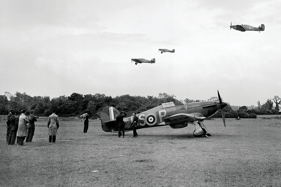Hurricanes of RAF No. 56 Squadron embark on a mission from North Weald. (Imperial War Museum CH158)