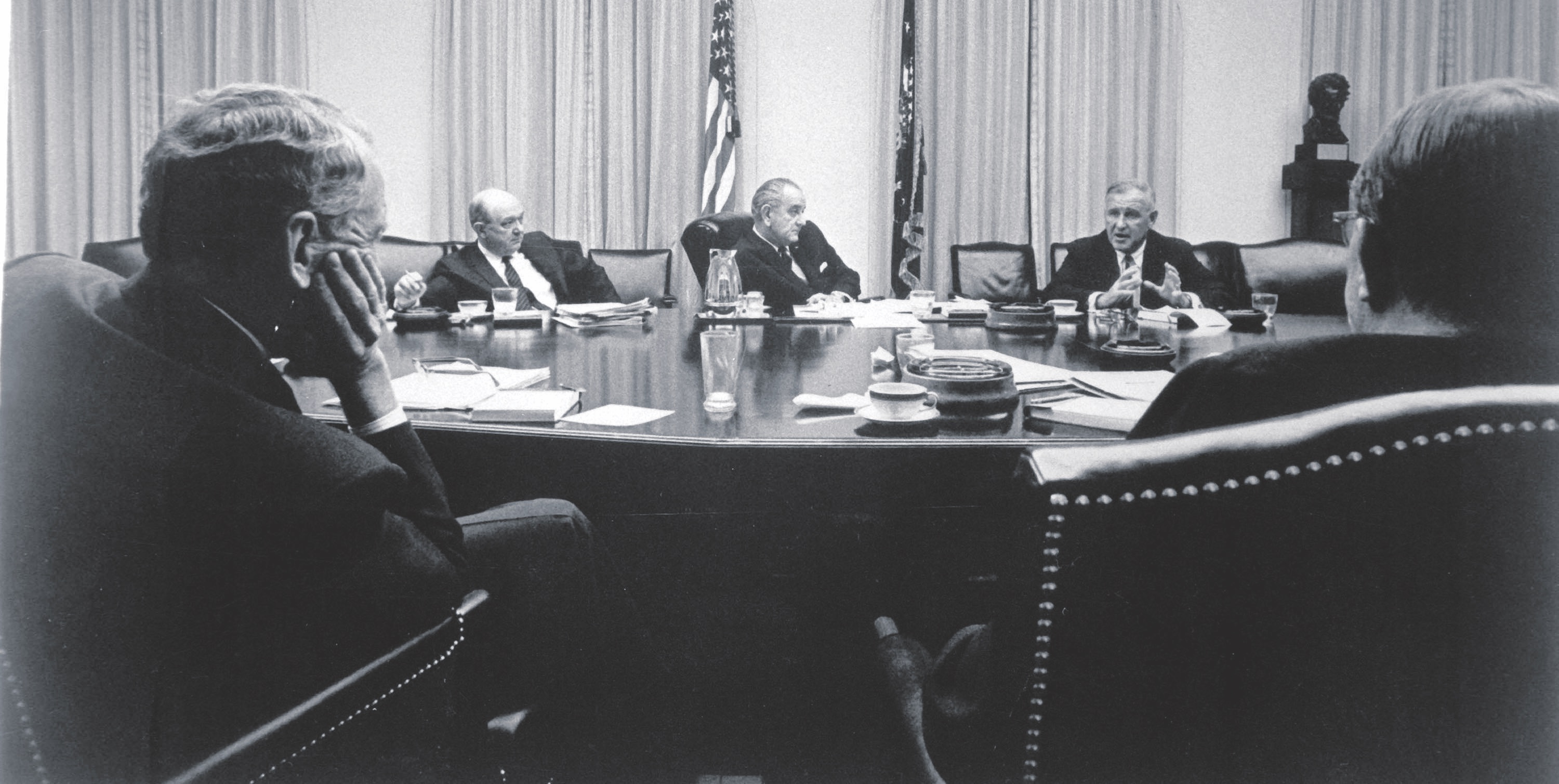 Lyndon B. Johnson and his advisers meet on Oct. 29, 1968, to review the situation in Vietnam. Johnson said in a 1965 speech that the United States had pledged to help South Vietnam defend its independence, “and I intend to keep our promise.” (American Photo Archive/Alamy)