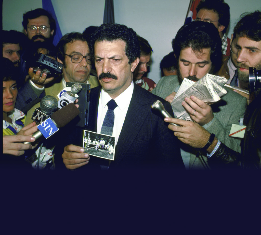 São Paulo's police chief, Romeu Tuma (above), answers reporters' questions on the search for Mengele. During the press conference, he displayed a photo (below) of the fugitive in Brazil in the 1970s. (Robert Nickelsberg/The Life Images Collection/Getty Images)