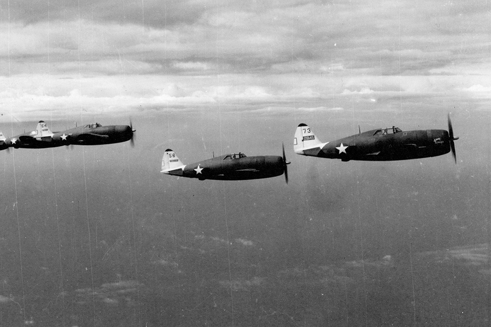 Kearby (far right) leads two flights of the 348th Fighter Group on a patrol from Port Moresby, New Guinea. (Courtesy of John Stanaway)