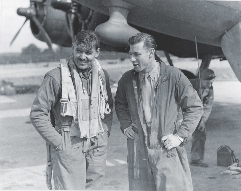 Gable with copilot Lieutenant Colonel Robert W. Burns in 1943. (Associated Press)
