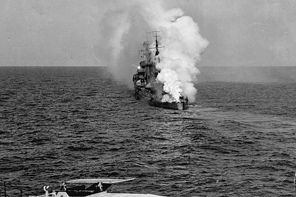 The light cruiser HMS Carlisle smokes from its stern after the initial Ju-87 attack. (Courtesy of Anthony Rogers)