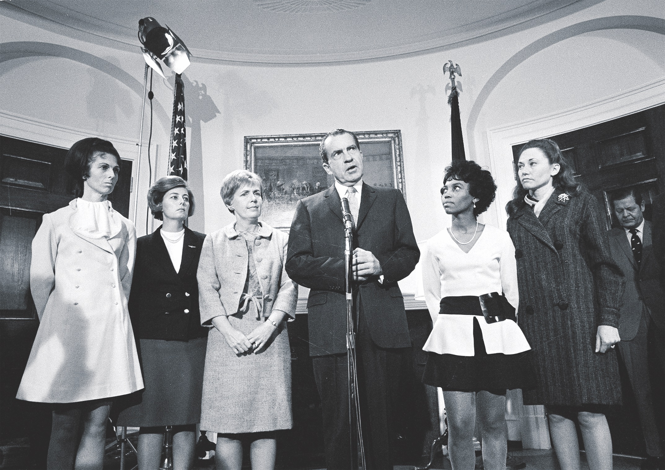 At a news conference on Dec. 12, 1969, Nixon, flanked by POW wives, lashed out at Hanoi for its mistreatment of prisoners. From left are Carol Hanson, Louise Mulligan, Sybil Stockdale, Andrea Rander and Pat Mearns. (AP Photo/Harvey Georges)
