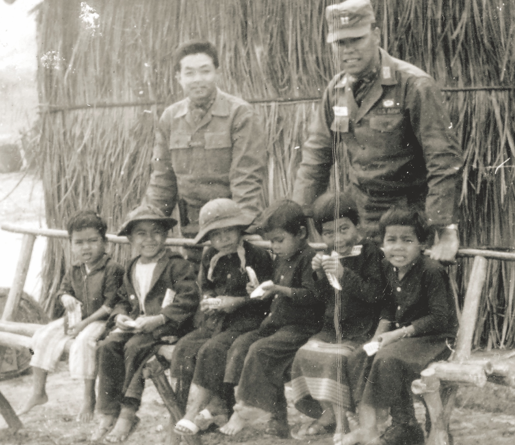 South Vietnamese battalion commander Capt. Vo Cong Hieu, at left, and his American adviser developed a good rapport, but Powell had less respect for the leadership abilities of two other unit leaders he advised. Powell and Hiu visited the children of an A Shau Valley tribe in 1963. (Courtesy Colin Powell)