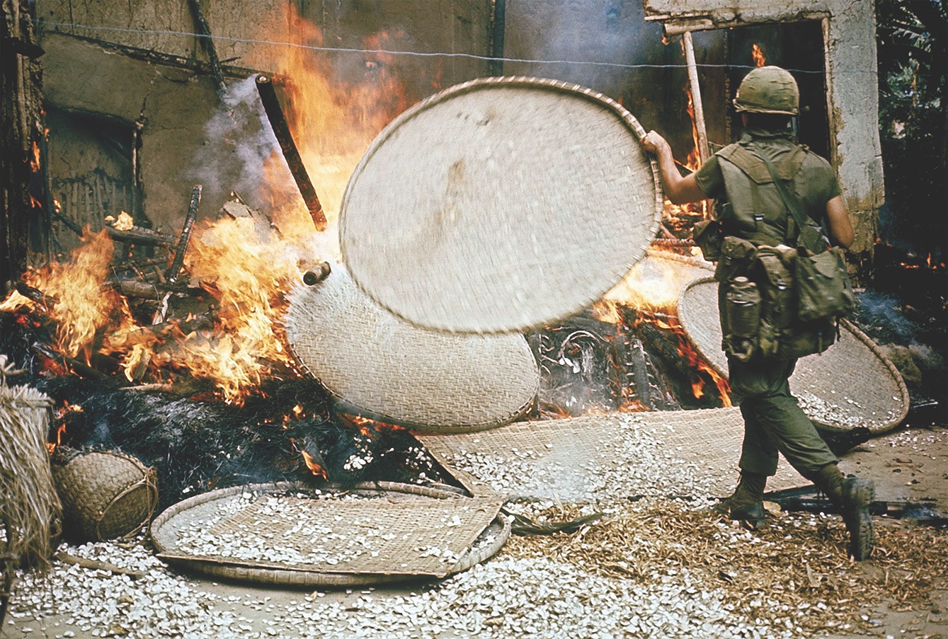 The atrocities at My Lai, burning homes and killing hundreds of civilians, occurred before Powell’s second tour, but he faced questions about the Army’s cover-up of the incident. (Ronald S. Haeberle; The Life Images Collection via Getty Images)