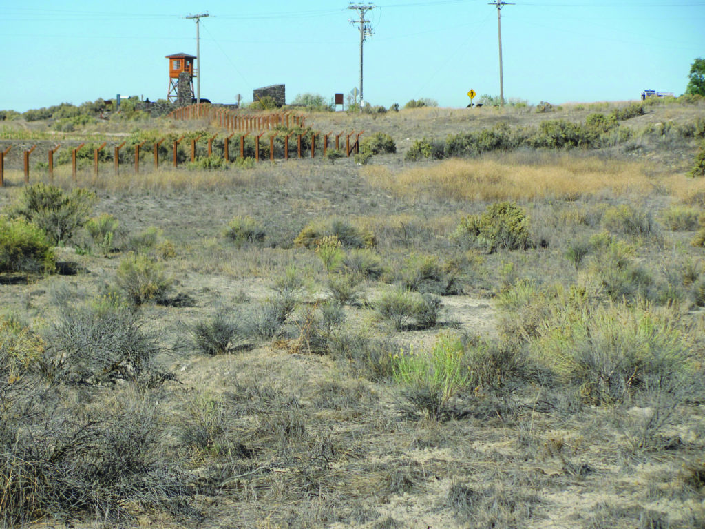 Today, Minidoka retains the dust-and-sagebrush setting that internees encountered upon their arrival 75 years ago. A reconstructed guard tower is one of the few physical reminders of the old camp. (Larry Porges)