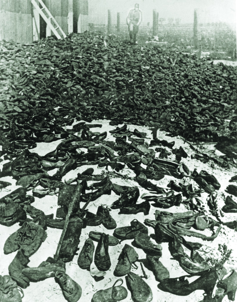 Shoes taken from Jews at killing centers in Poland were stored at the Lublin/Majdanek camp; their weight collapsed the storehouse. (Everett Collection Inc/Alamy Stock Photo)
