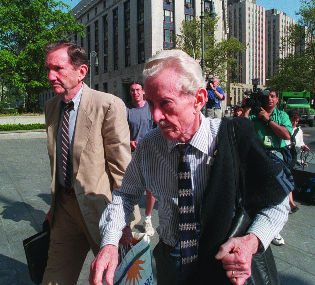  Reimer, accompanied by attorney Ramsey Clark, arrives at court in New York in August 1998; the 79-year-old retiree insisted he was innocent. (Mitch Jacobson/Associated Press)