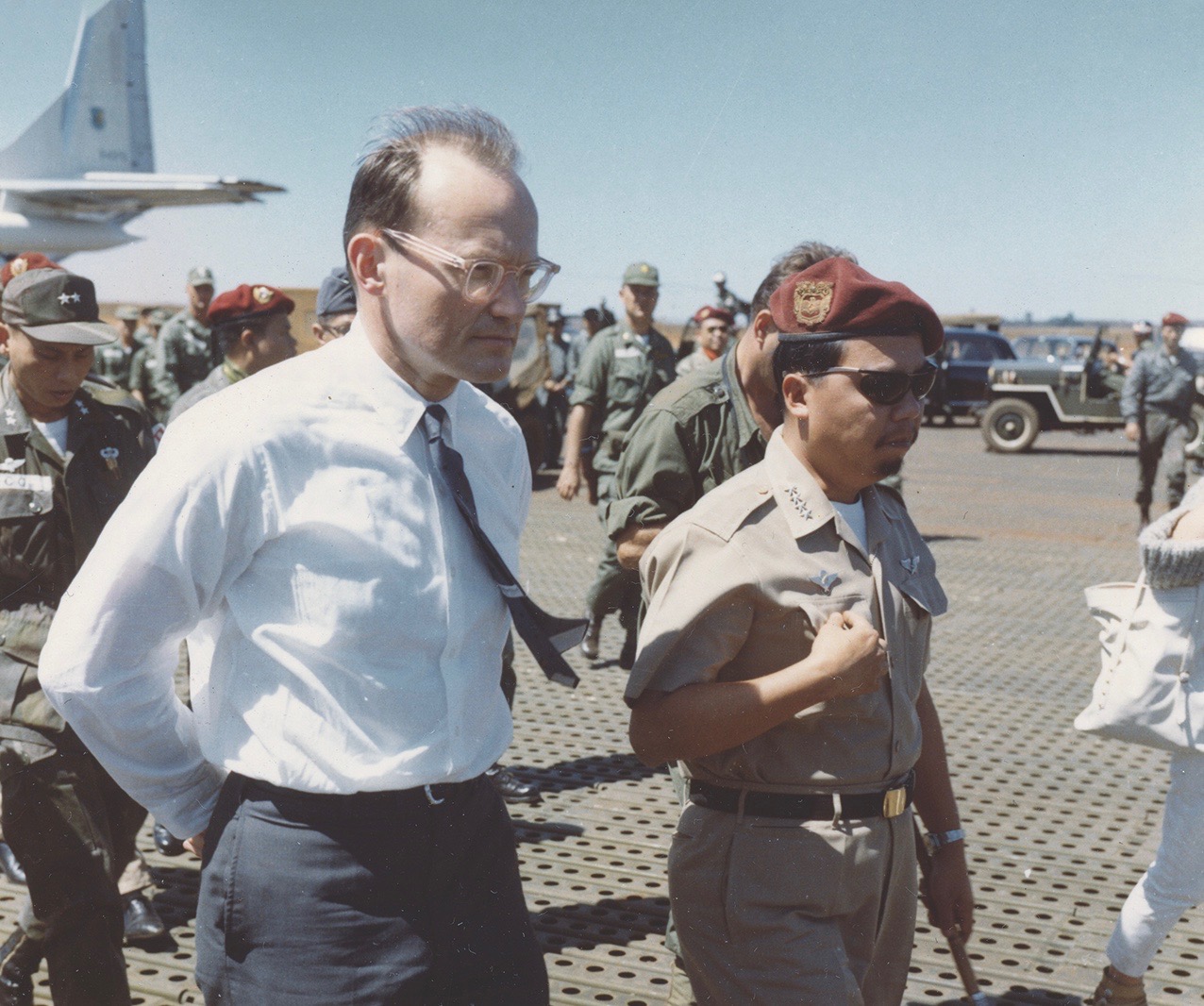 Presidential adviser McGeorge Bundy visits an Army base near Pleiku struck by the Viet Cong in February 1965. He recommended U.S. retaliation. (National Archives)