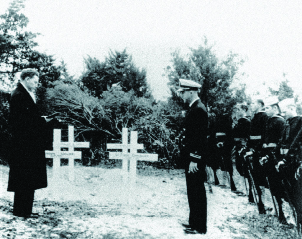 Following their 1942 burial (above), the lost Bedfordshire sailors became an intrinsic part of Ocracoke Island’s heritage, thanks in part to an annual memorial ceremony (below). (Graveyard of the Atlantic Museum)