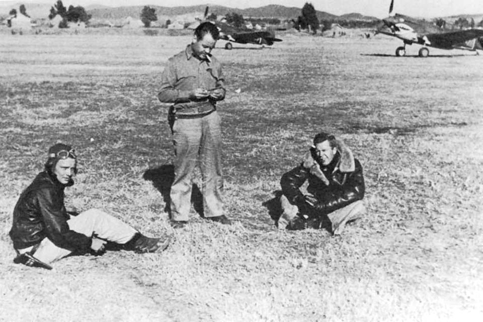 Boyington (center) takes a smoke break with squadron mates John Farrell (left) and John Croft. Since arriving at the AVG base at Kunming, China, Boyington was frustrated by a lack of action. (HISTORYNET Archives)