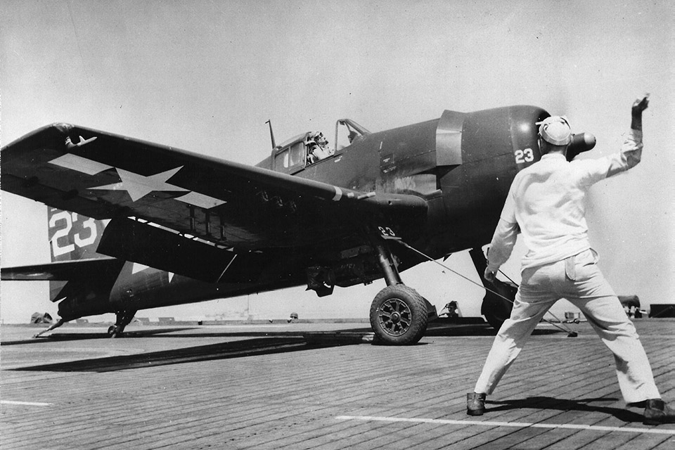 An F6F-5 from VF-74 prepares to launch from USS Kassan Bay, bound for targets in southern France. (National Archives)
