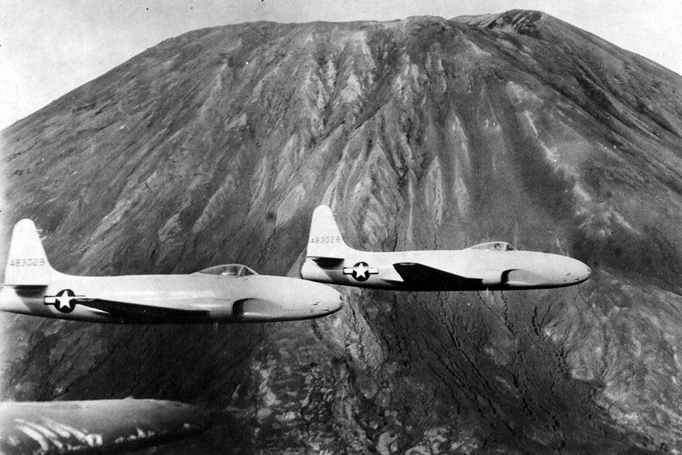 Four YP-80A prototypes were sent overseas, two headed to the Mediterranean, (shown here passing Mt. Vesuvius,) where one fighter, flown by 94th Fighter Squadron pilot Maj. Ed LaClare flew at least two “operational sorties.” (National Archives)