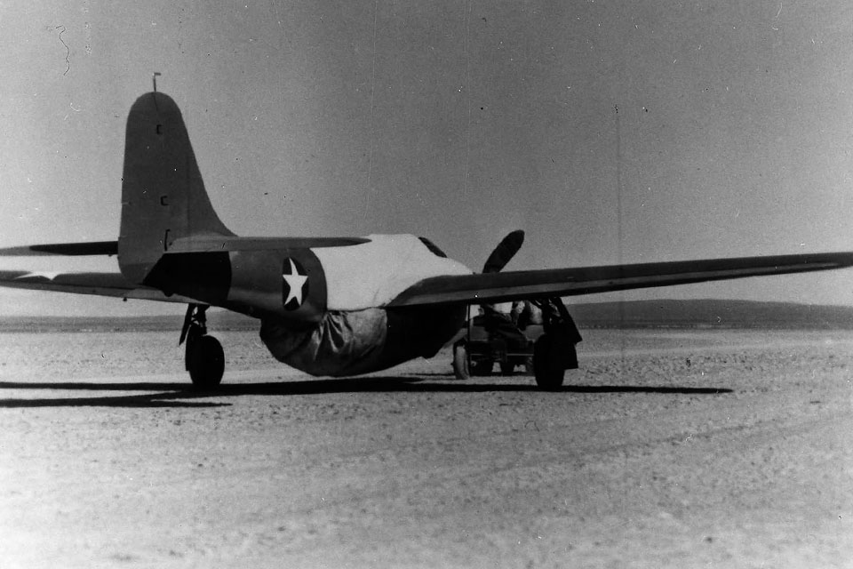 The secrecy that surrounded the XP-59 project would include a makeshift false wooden propeller that in reality fooled few on the ground at the Muroc Army Air Field testing facility. (National Archives)