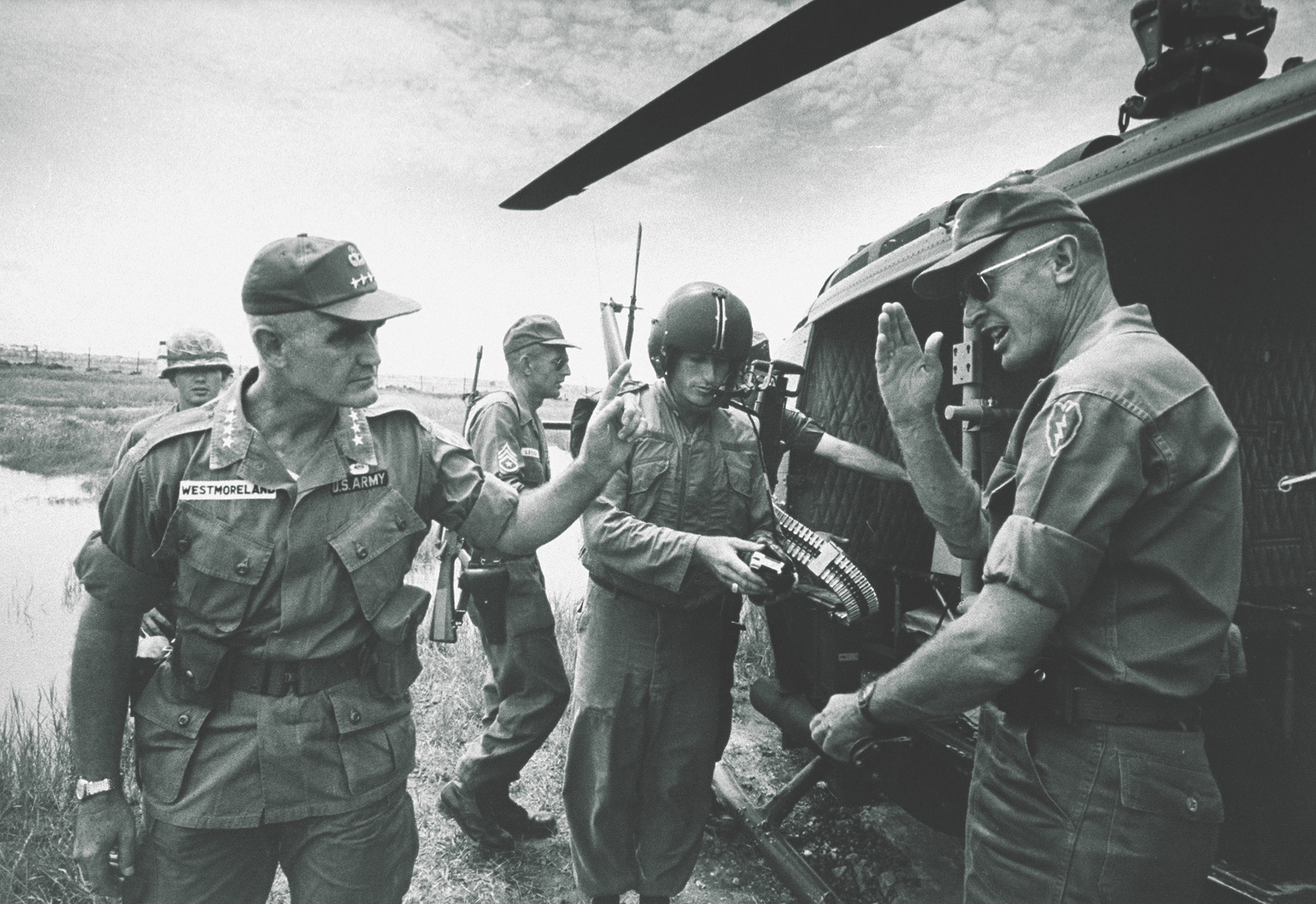 Gen. William Westmoreland, the top U.S. commander in Vietnam, approaches Frederick Weyand, commander of the 25th Infantry Division, in 1966. Westmoreland was warned on Jan. 30, that an attack was imminent. Weyand had already put his troops on alert. (Co Rentmeester/The Life Picture Collection via Getty Images)