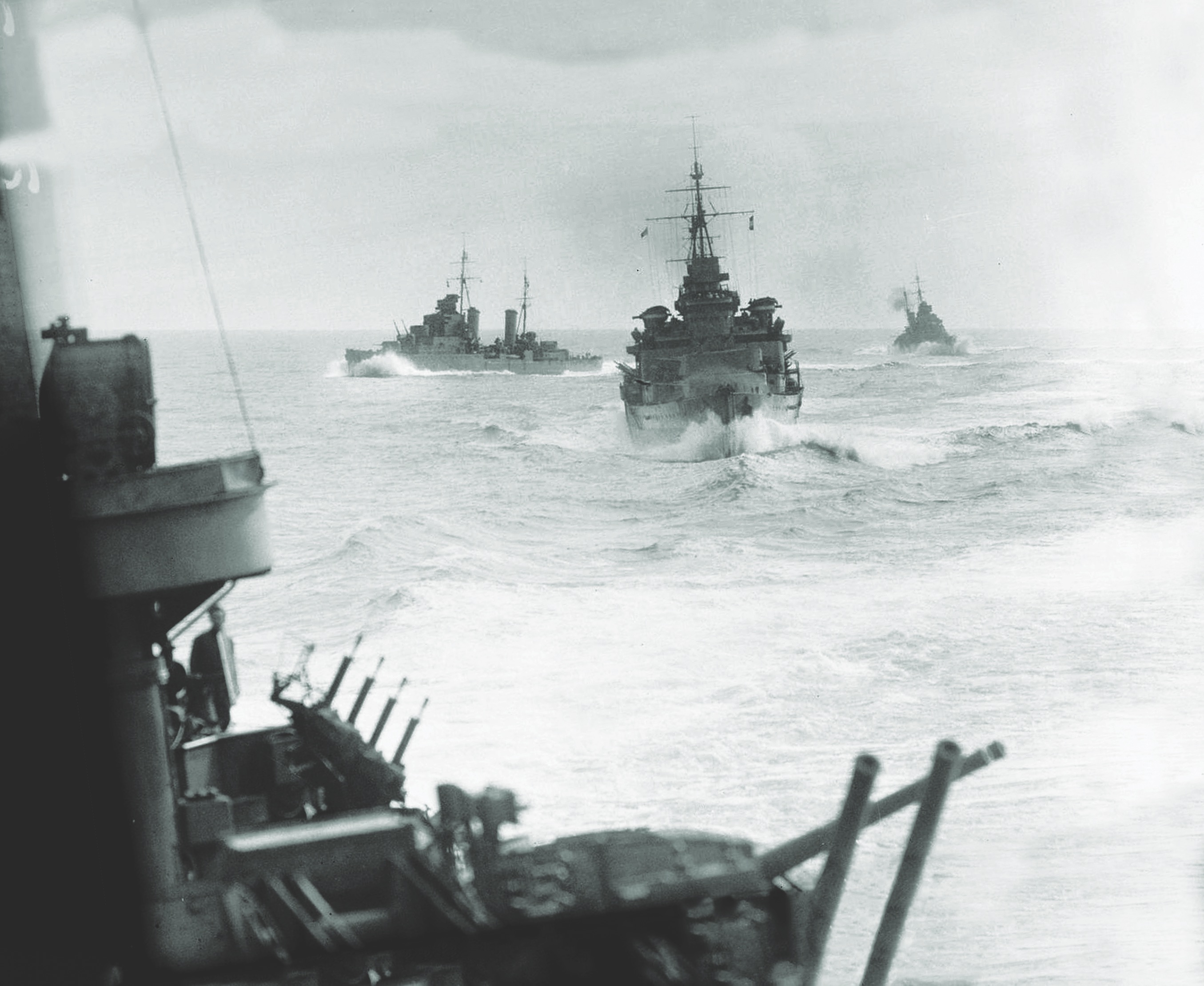 The British light cruisers Hermione, Edinburgh and Euryalus maneuver while escorting a convoy to Malta. On June 16, 1942, the German sub U-205 sank Hermione off the island. (Imperial War Museums)