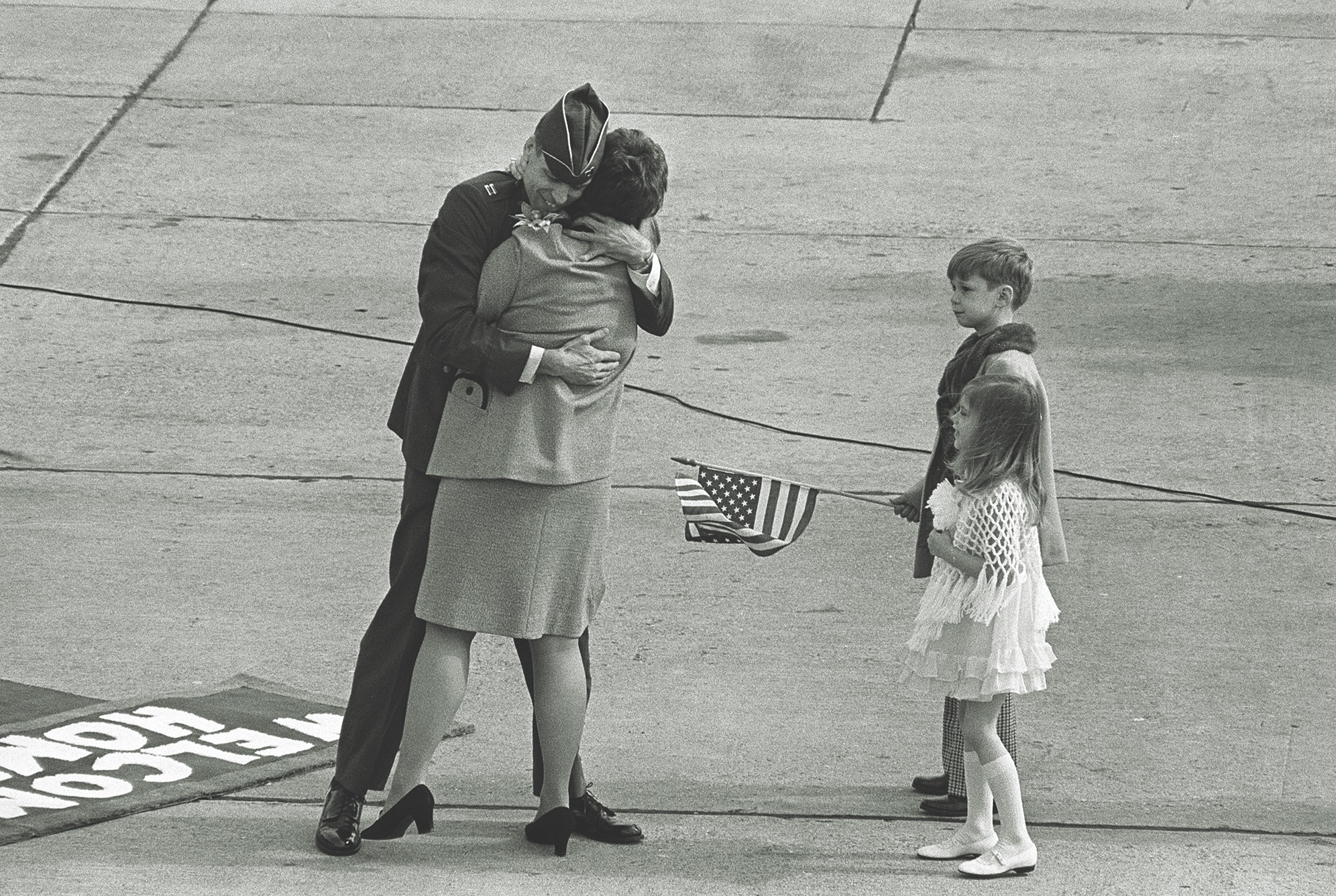 Air Force Capt. Michael S. Kerr, captured in 1967, has an emotional homecoming with wife Jerri on March 7, 1973, at Travis Air Force Base in California. The Kerrs later divorced. (Bettmann/Getty Images)