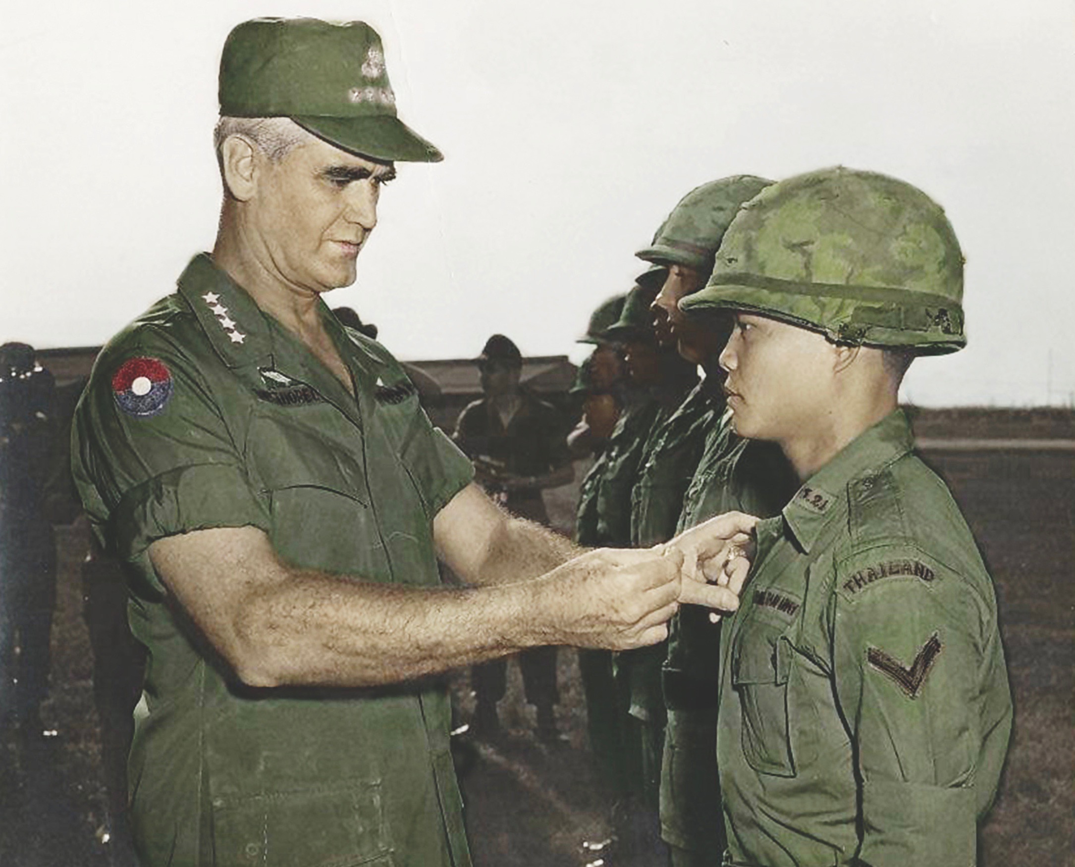 Gen. William Westmoreland, the top U.S. commander in South Vietnam, awards a Thai soldier in 1968. (U.S. Army)