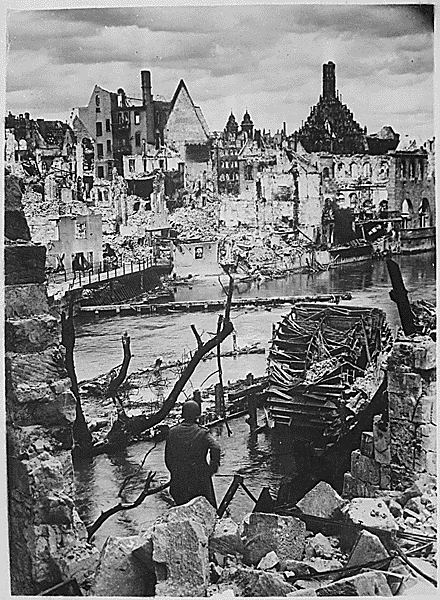 A soldier overlooks the ruins of Nuremberg. (National Archives)