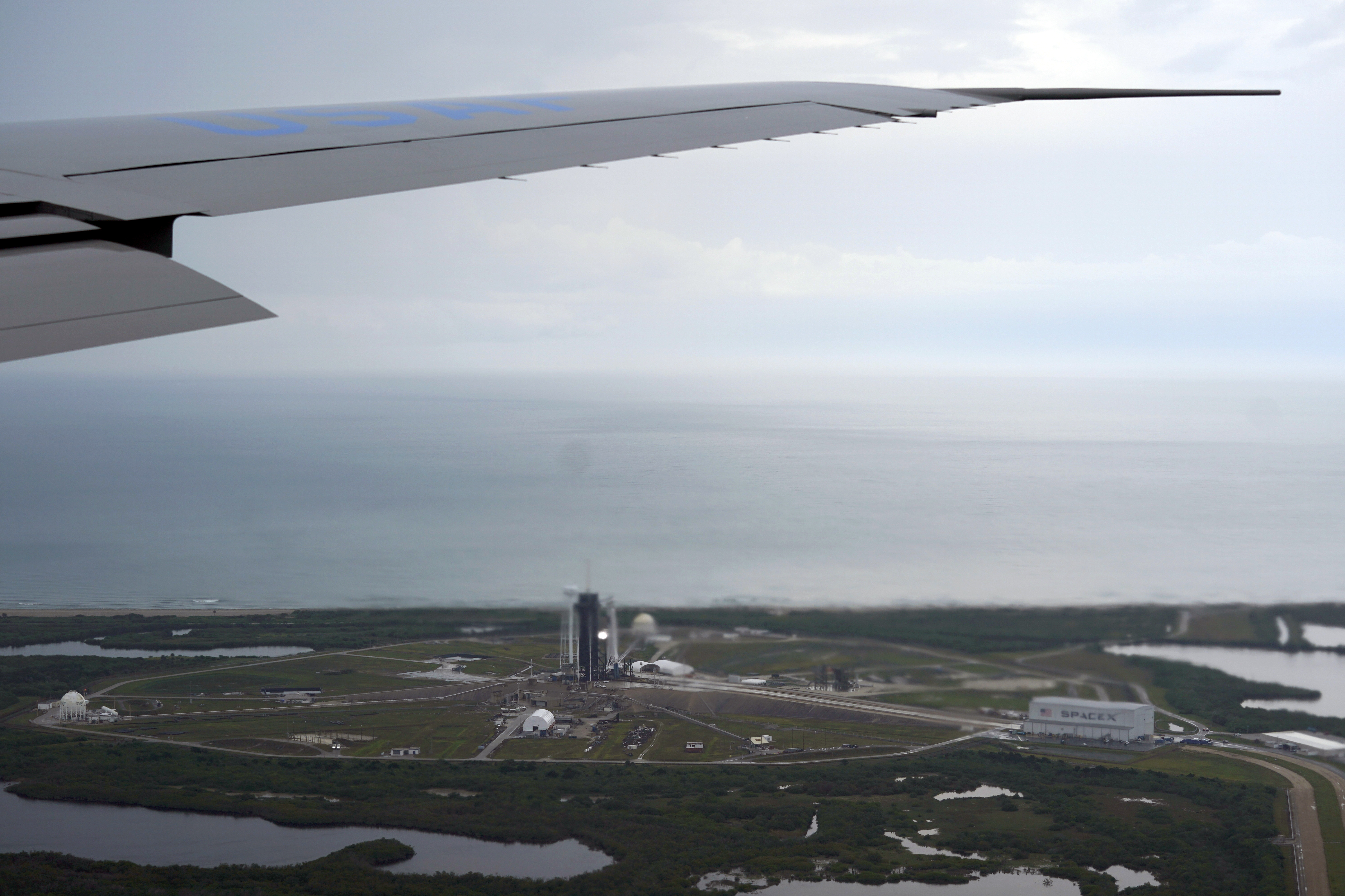 The SpaceX launch pad is seen from the window of Air Force One at Kennedy Space Center. (AP Photo/Evan Vucci)