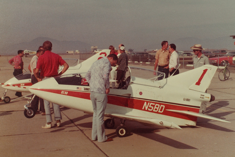 Curious onlookers examine two BD-5Js used by Corkey Fornof’s jet demonstration team in the 1970s. (San Diego Air & Space Museum)