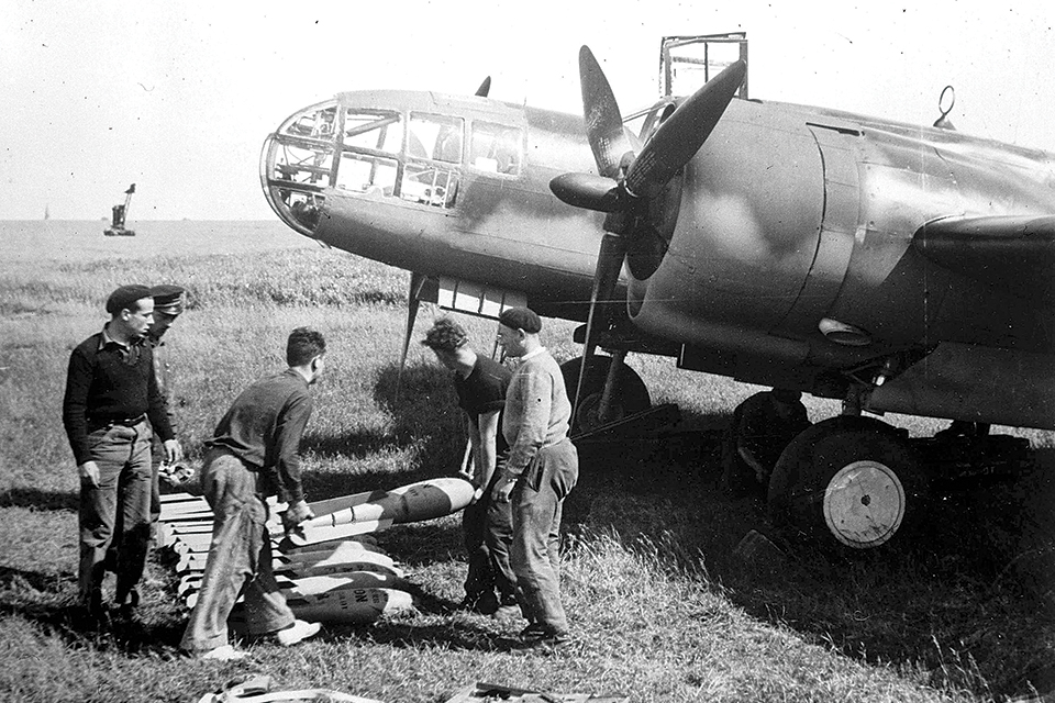French ground crewmen bomb up an American-supplied Martin 167 Maryland. (Popperfoto via Getty Images)