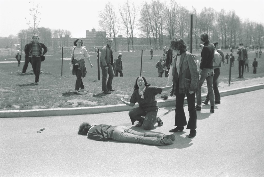 in one of the most published photos of May 4, Mary Ann Vecchio kneels at the body of Jeffery Miller. Photographer John Paul Filo, a student working for the Valley Daily News and Daily Dispatch near Pittsburgh, won the 1971 Pulitzer Prize for spot news photography. (John Filo/Getty Images)