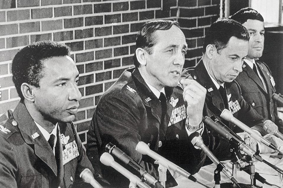 Risner (second from left) and fellow American POWs describe the torture they endured at the Hanoi Hilton. (Bettmann/Getty Images)