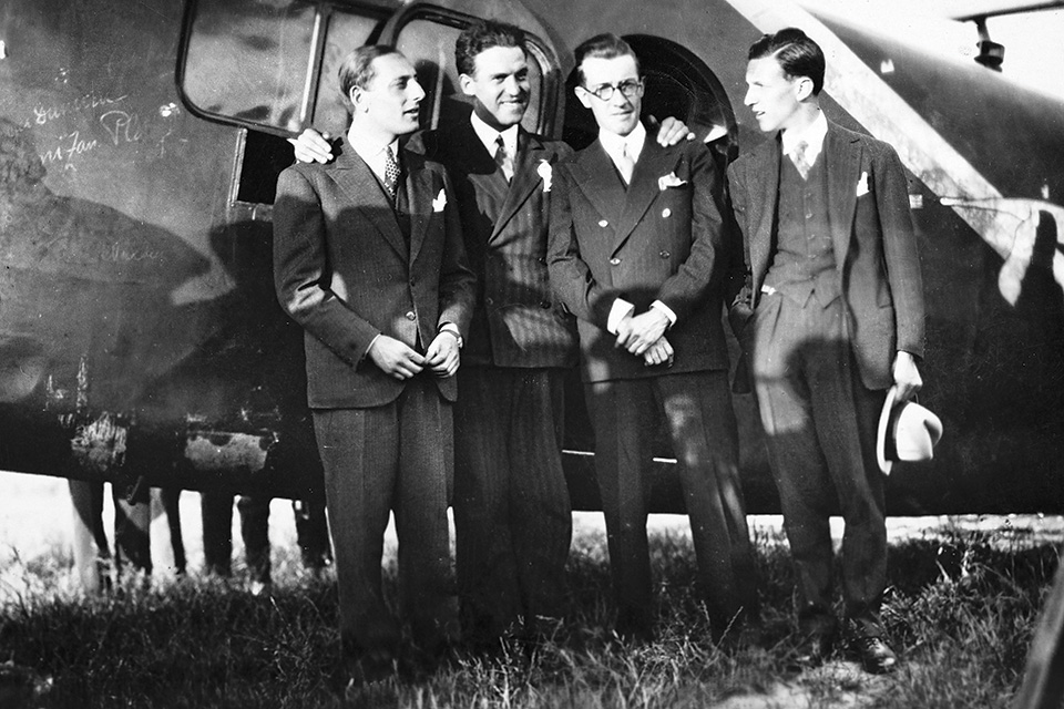 From left: Assollant, Lefèvre, Lotti and stowaway Arthur Schreiber prepare to meet the press at Le Bourget Airport on the outskirts of Paris. (Courtesy of the Lotti Family)
