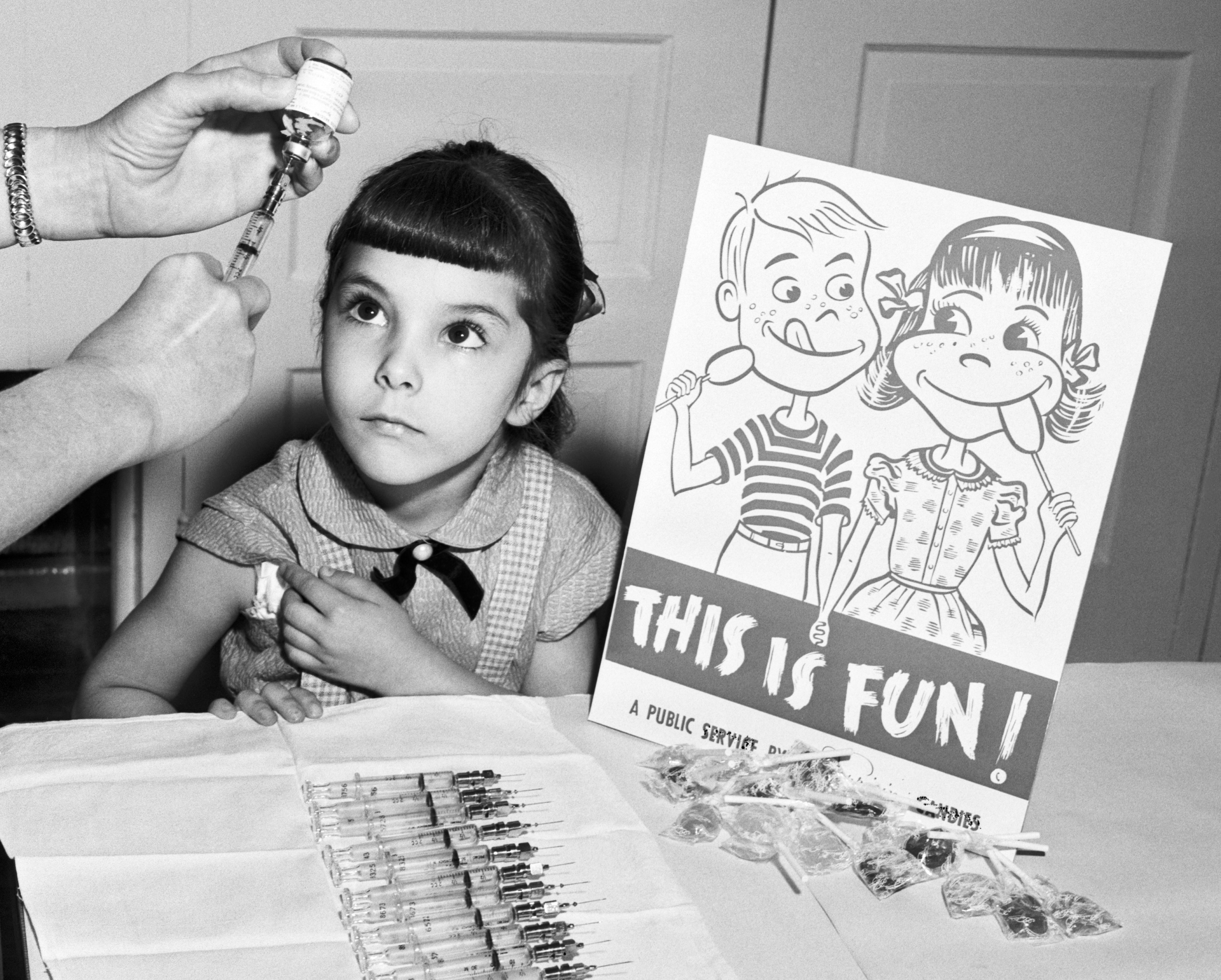 A little girl awaiting her polio vaccine during the 1950s. (H. Armstrong Roberts/Getty Images)
