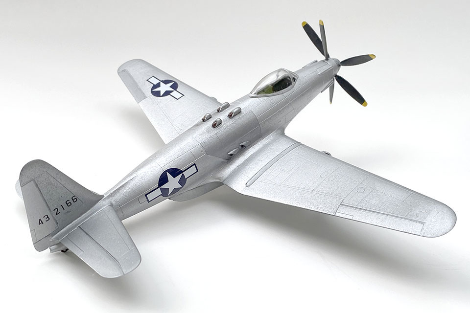 The finished model depicts the last of six prototypes built of the P-75A Eagle, serial no. 44-32166.