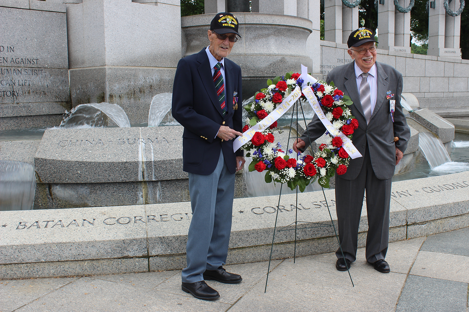 Merrill’s Marauders (L-R) Gilbert Howland, 97, and Bob Passanisi, 96, place a wreath near the China Burma India Theater monument of Washington D.C.’s WWII Memorial in 2019 during a trip to gain support for the Congressional Gold Medal. (Jonnie Melillo Clasen)
