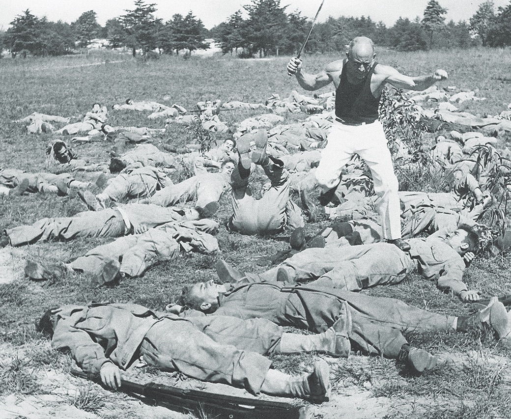 D’Eliscu, bayonet in hand, runs over trainees in one of his unconventional drills at Fort Meade, Maryland, in 1942.