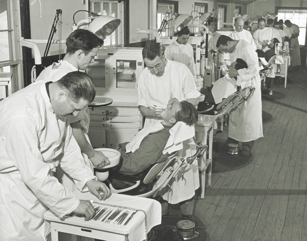 While eventually assigned to the Army Dental Corps (above), Salomon found his interests and talents more aligned with soldiers’ work. They converged when he manned an improvised hospital at the front, like this Marine facility (below) on Bougainville. (George Strock/The LIFE Picture Collection via Getty Images)